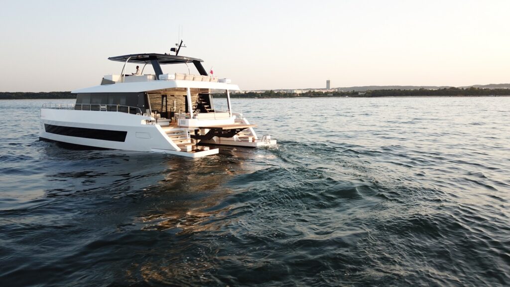 Arctic Moon, a Moon 60 Power catamaran, under way