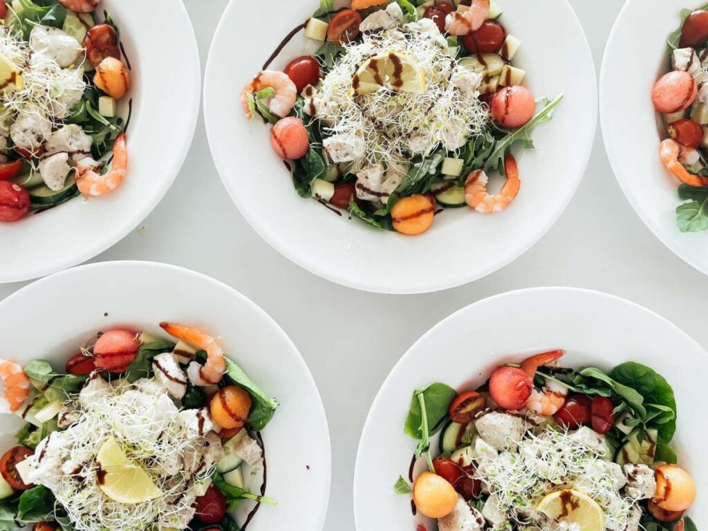 Lunch salads with prawns served aboard